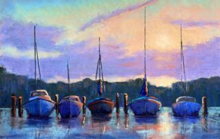 I just finished a kayak ride when the setting sun started to duck behind the cloud bank on Swan Creek.The sun’s orange and yellow light touched the tops of these boats that were tucked in for  the night. The air was warm and still. My kayak rocked gently in the water. All was Quiet