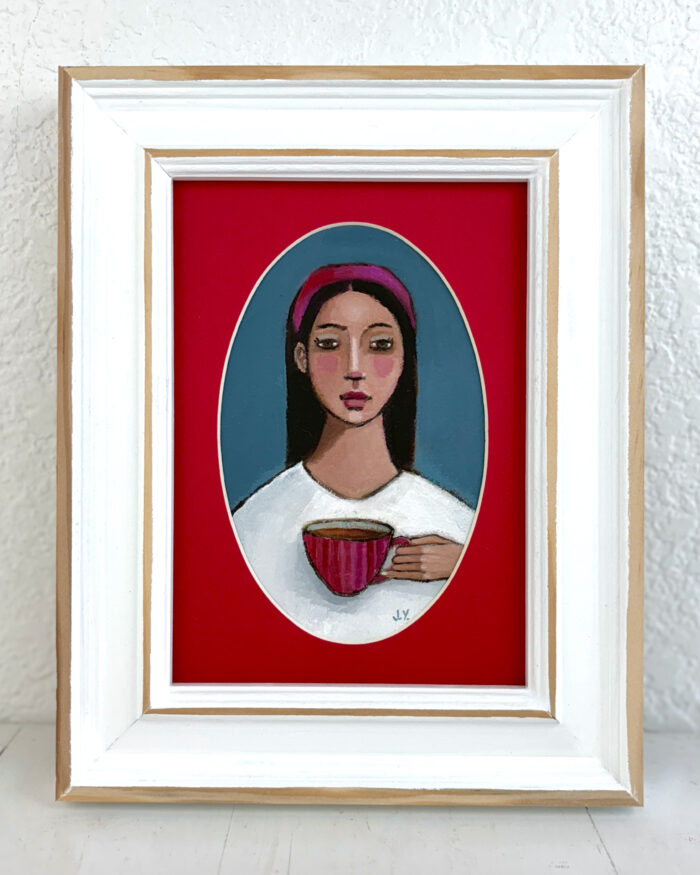 Girl Holding a Teacup